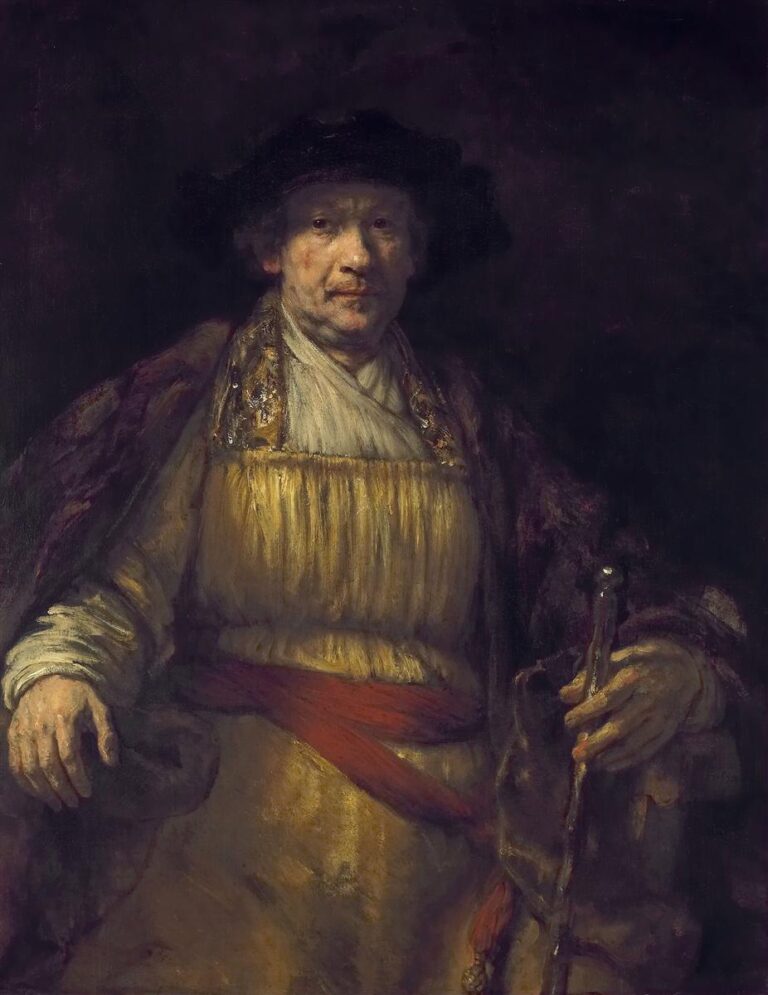 Rembrandt seated frontally in a dark hat and mantle, pale pleated tunic and red sash glowing, one hand resting on a chair arm and the other holding a cane, face lit against a deep brown background.