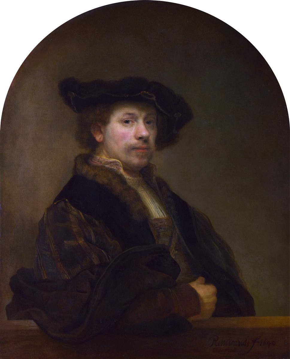Half-length self-portrait by Rembrandt in a dark fur-trimmed mantle and soft cap, resting one hand on a stone ledge, head turned toward the viewer in warm light against an arched brown background.
