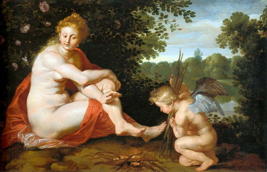 Venus sits nude under a leafy bower with red drapery while Cupid crouches by a small fire, using his arrows as kindling; warm firelight glows on their skin against a cool green riverside landscape, visualizing the proverb that without grain and wine, love grows cold.