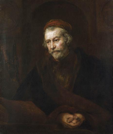 Rembrandt’s late portrait of the Apostle Paul seated in a dark room, wearing a modest red cap and brown cloak, softly lit from the left, with an open book on the table and hands loosely clasped as he reflects in silence.