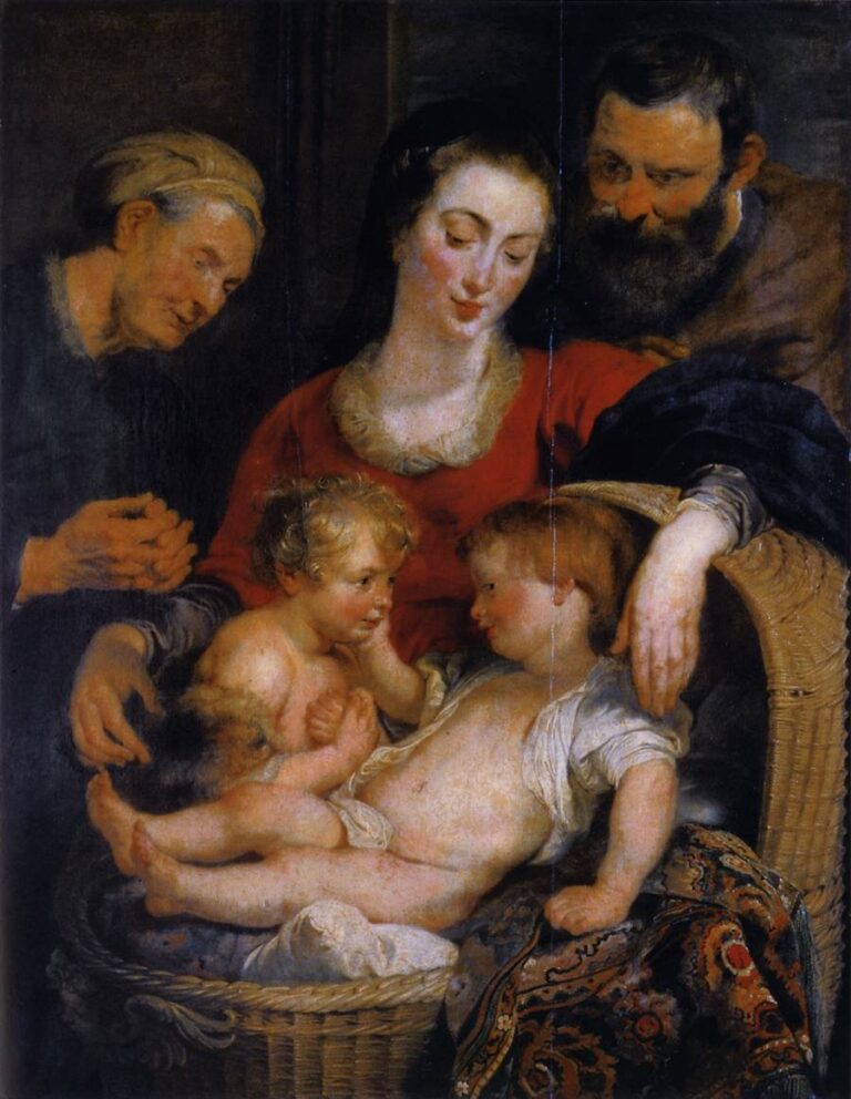 In a warmly lit interior, Mary in a red dress leans over a wicker basket where the infant Jesus and young John the Baptist touch cheeks; St. Elizabeth smiles at left and St. Joseph watches at right, with patterned fabric draped across the foreground.