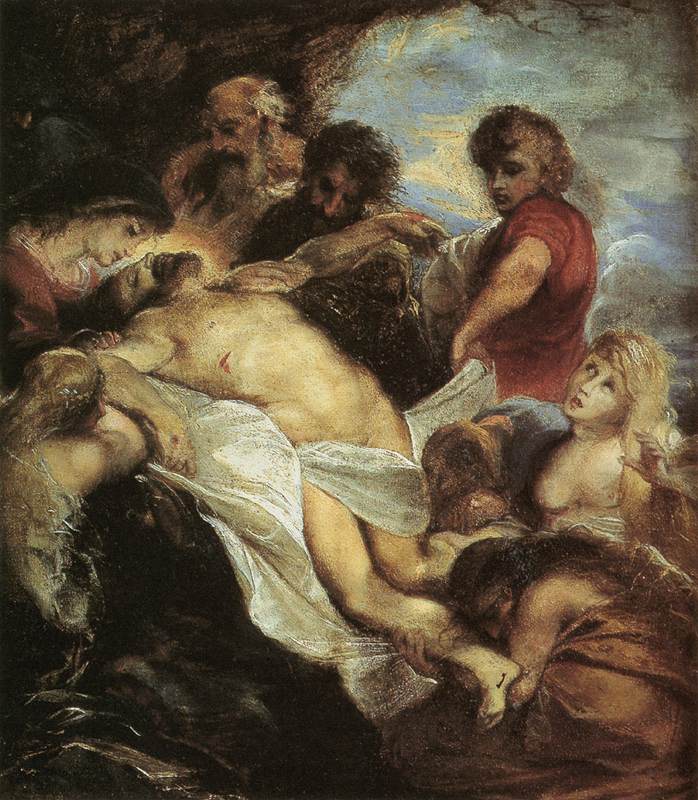 Intimate Baroque scene by Peter Paul Rubens showing the dead Christ laid on a white shroud inside a dark grotto, surrounded by Mary, the Magdalene, Saint John, and mourners who cradle his body in lamplike light.