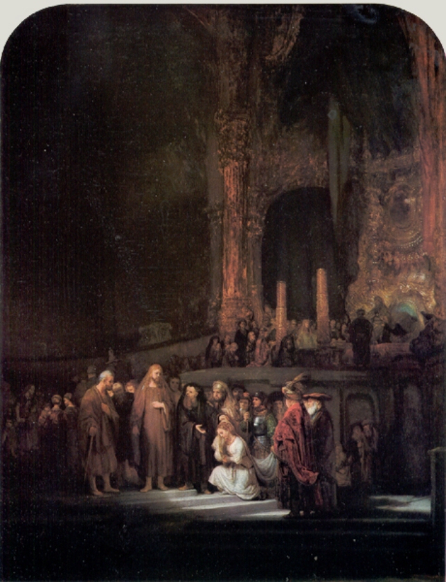 Interior scene by Rembrandt with a kneeling woman in white beside a standing Christ on a lit pavement, surrounded by dark-robed accusers and onlookers beneath towering, shadowy temple architecture glowing with gold highlights.