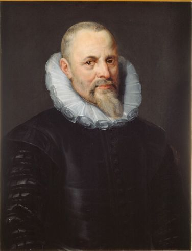 Half length portrait of Jan I Moretus by Peter Paul Rubens, showing a middle aged man in black clothing with a large white ruff, short grey hair, and a pointed beard, posed against a dark background with a calm, thoughtful expression.