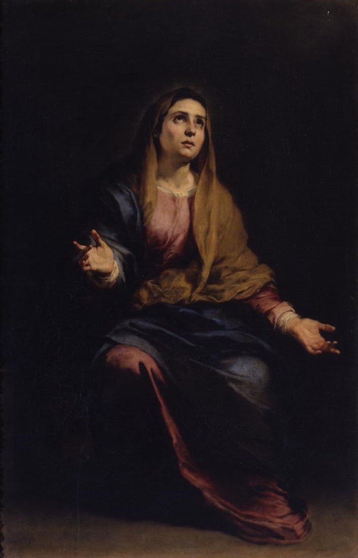 Baroque painting of the Virgin Mary kneeling in a dark space, wearing a blue mantle and ocher veil, with hands open in supplication and eyes lifted upward in sorrowful prayer.