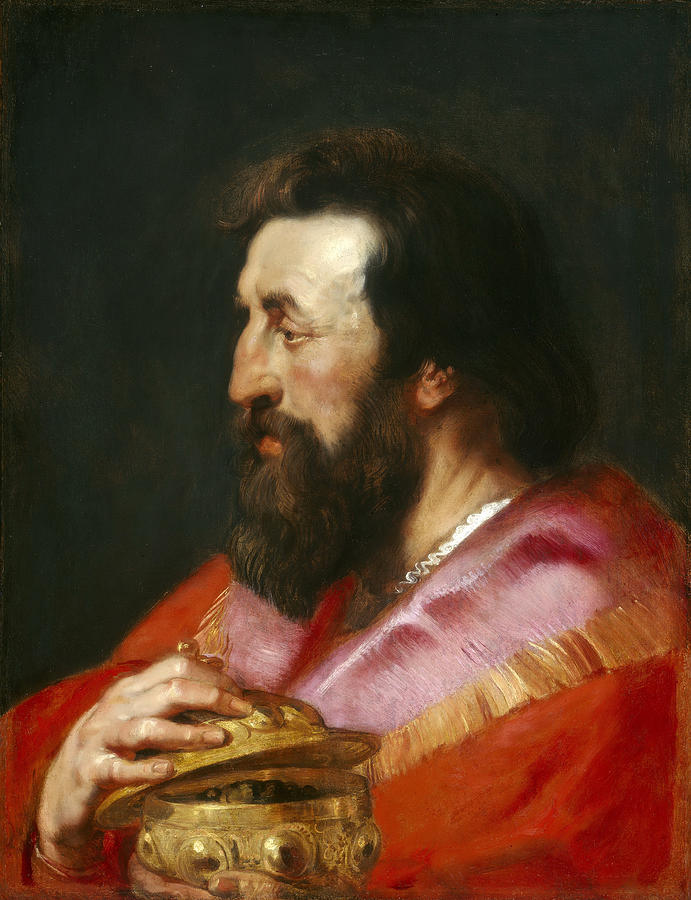 Baroque painting by Peter Paul Rubens showing King Melchior in profile against a dark background, with a full beard, red and violet cloak, and hands gently holding an ornate golden vessel as he gazes thoughtfully toward the left.