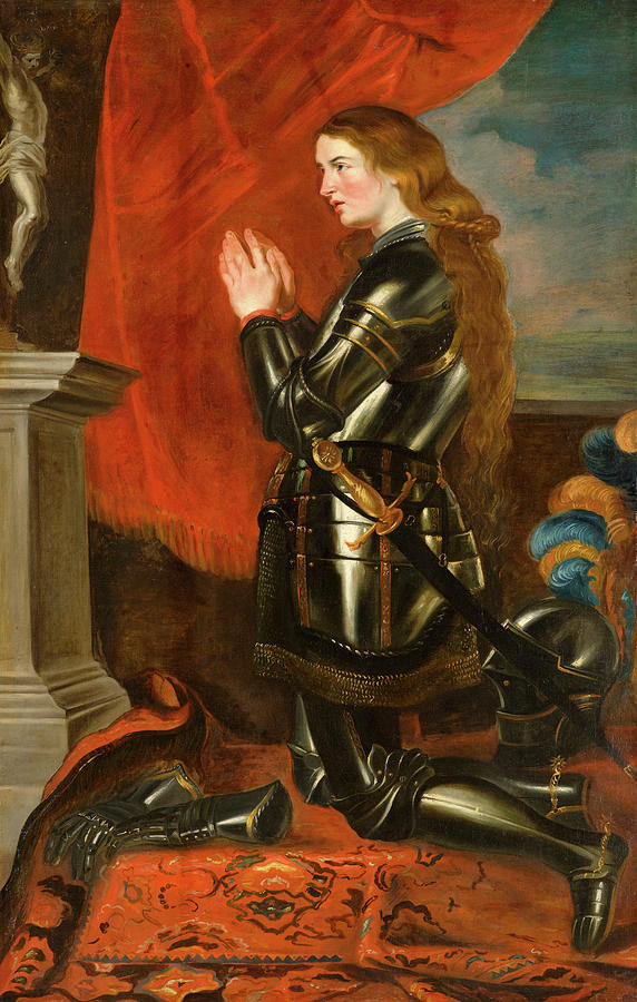 Vertical painting of Joan of Arc in polished black armor kneeling on a patterned red carpet, hands clasped in prayer before a crucifix on an altar, with a sweeping red curtain behind her and her long auburn hair flowing down her back.