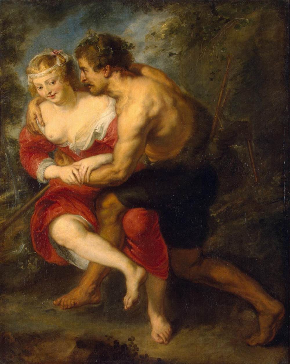 Baroque painting by Peter Paul Rubens showing a bare-chested, wreath-crowned herdsman embracing a fair young woman in a low-cut red dress, their bare legs intertwined as they sit on earthy ground in a shaded woodland landscape.