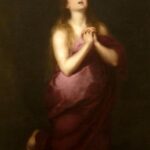 Painting by Bartolomé Esteban Murillo showing Saint Mary Magdalene kneeling alone in a dark space, wrapped in a deep red robe, hands clasped at her chest and eyes raised toward heaven, with a skull, open book, and small jar resting on the ground beside her.