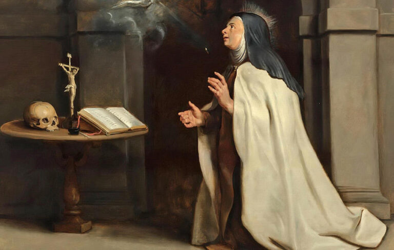 Painting by Peter Paul Rubens showing Saint Teresa of Avila kneeling in a stone cell, hands raised toward a small glowing dove of the Holy Spirit, with a table beside her holding a skull, crucifix, and open book.