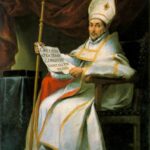 Baroque painting by Murillo showing Saint Leander of Seville seated in a wooden chair wearing white and gold bishop’s vestments and mitre, holding a crozier in one hand and a Latin inscribed scroll in the other, with a dark curtain and table in the background.