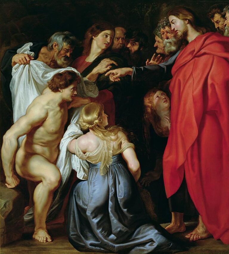 Baroque painting by Peter Paul Rubens showing Christ in a red robe extending his hand toward the newly revived Lazarus, who rises from a tomb wrapped in a white shroud, surrounded by kneeling women and astonished onlookers against a dark background.