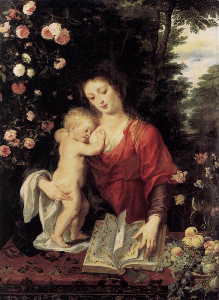 Madonna in a red robe stands in a garden, holding the curly-haired Christ Child who reaches toward her breast; an illuminated book lies open on a patterned table with grapes, peaches, and flowers nearby; roses climb at left and trees recede into a pale sky, all painted with Rubens’s glowing color and soft light.