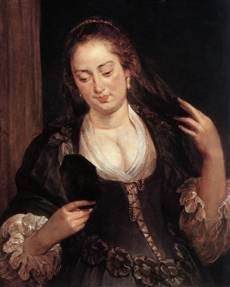Baroque portrait by Peter Paul Rubens depicting a young woman in a dark dress with white ruffled sleeves, holding a small mirror in one hand and lifting her hair with the other, her gaze turned downward in quiet contemplation against a dark background.