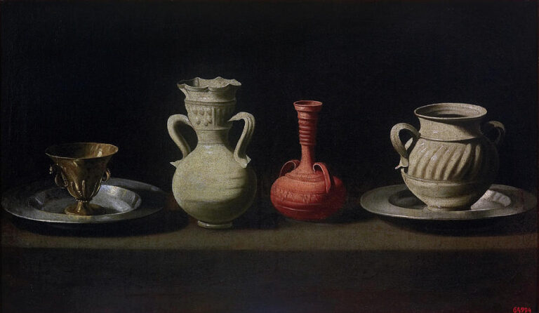 Four vessels stand in a row on a narrow ledge against a dark background in Zurbaran’s still life: a golden chalice on a silver plate, a pale two handled jug, a small red earthenware bottle and another pale jug resting on a second silver plate.