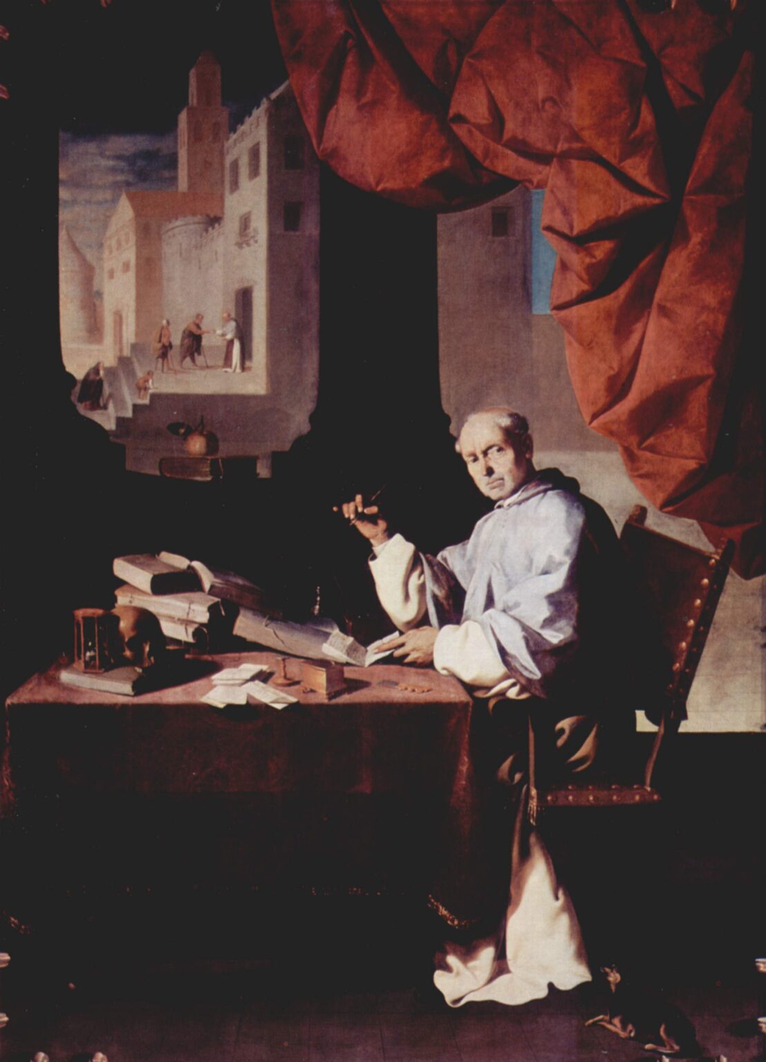 A seated monk in a white habit writes at a table piled with books, papers, an hourglass and a skull while a huge red curtain hangs above and an illuminated architectural scene with tiny figures appears on the dark wall behind him in Zurbaran’s portrait.