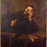 Baroque painting by Bartolome Esteban Murillo showing Saint Augustine in a dark room, leaning on a desk with his head resting on one hand and the other hand’s index finger raised, gazing toward a shaft of light while two large books lie on the table.