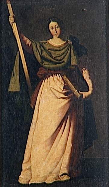 Full length image of St. Eulalia standing against a dark background, wearing a pale pink gown with a green mantle and red sash, holding two wooden beams that form a cross while she looks calmly toward the viewer.