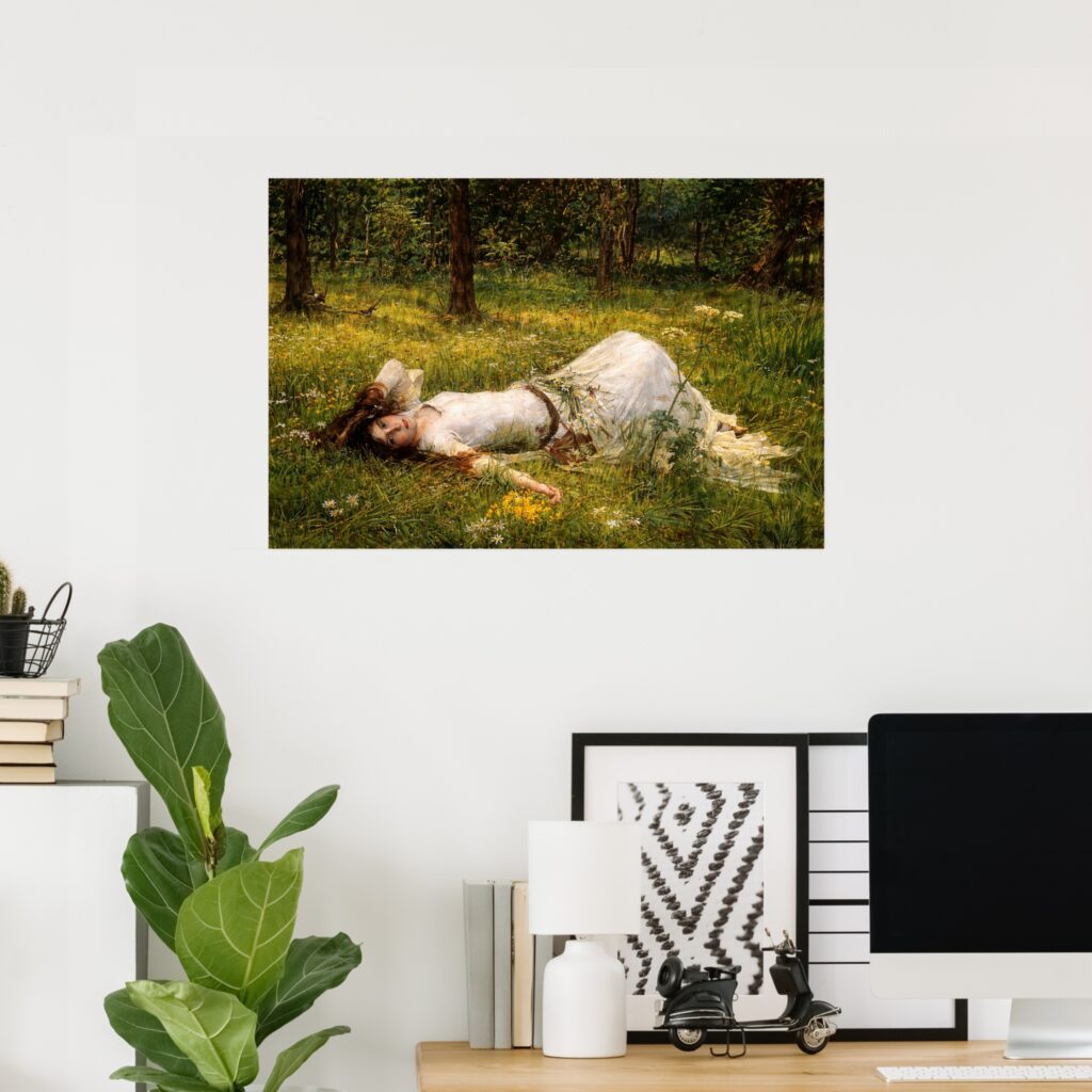 Poster of “Ophelia” by John William Waterhouse on a white wall in a modern home office, above a desk with a computer, framed art, lamp, books, and a green houseplant.