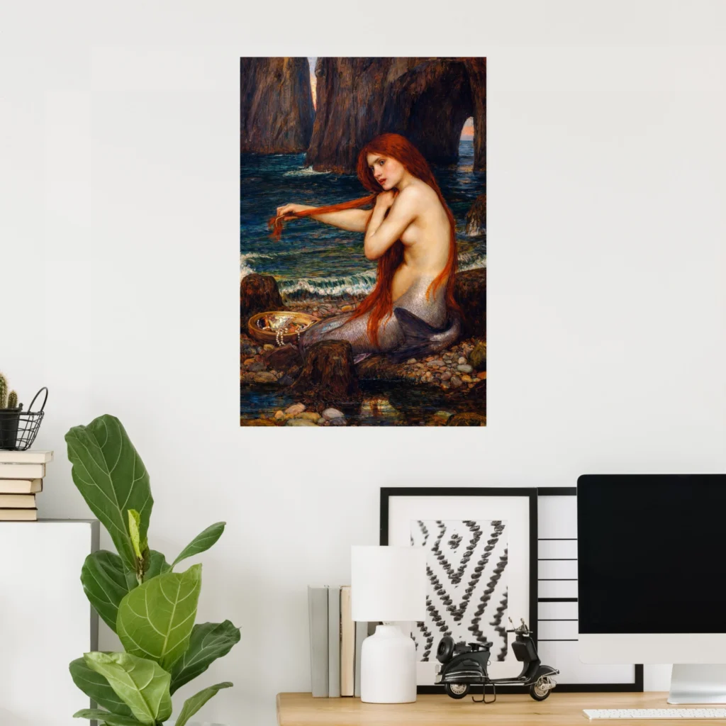 Poster print of “A Mermaid” by John William Waterhouse, featuring a red-haired mermaid sitting on a rocky shore beside the sea with dark cliffs and waves in the background.