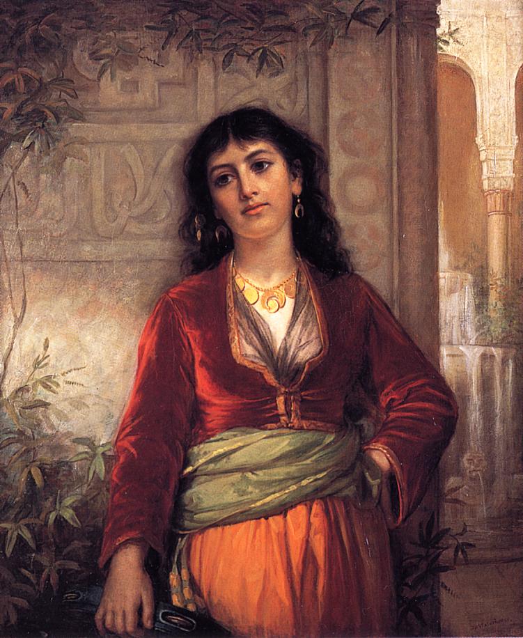 A young woman in rich red and orange clothing with a green sash stands in a shaded stone courtyard with arches and foliage, gazing away with a reserved, slightly weary expression.
