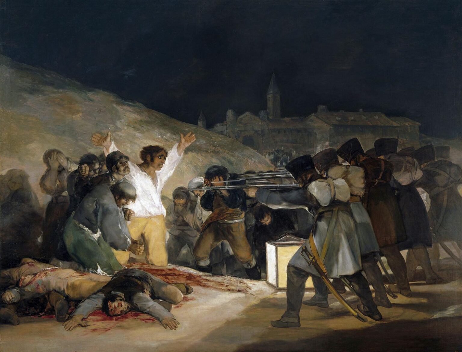 Francisco Goya’s “The Third of May 1808” showing French soldiers aiming rifles at Spanish civilians at night, with a central man in a white shirt raising his arms under lantern light.
