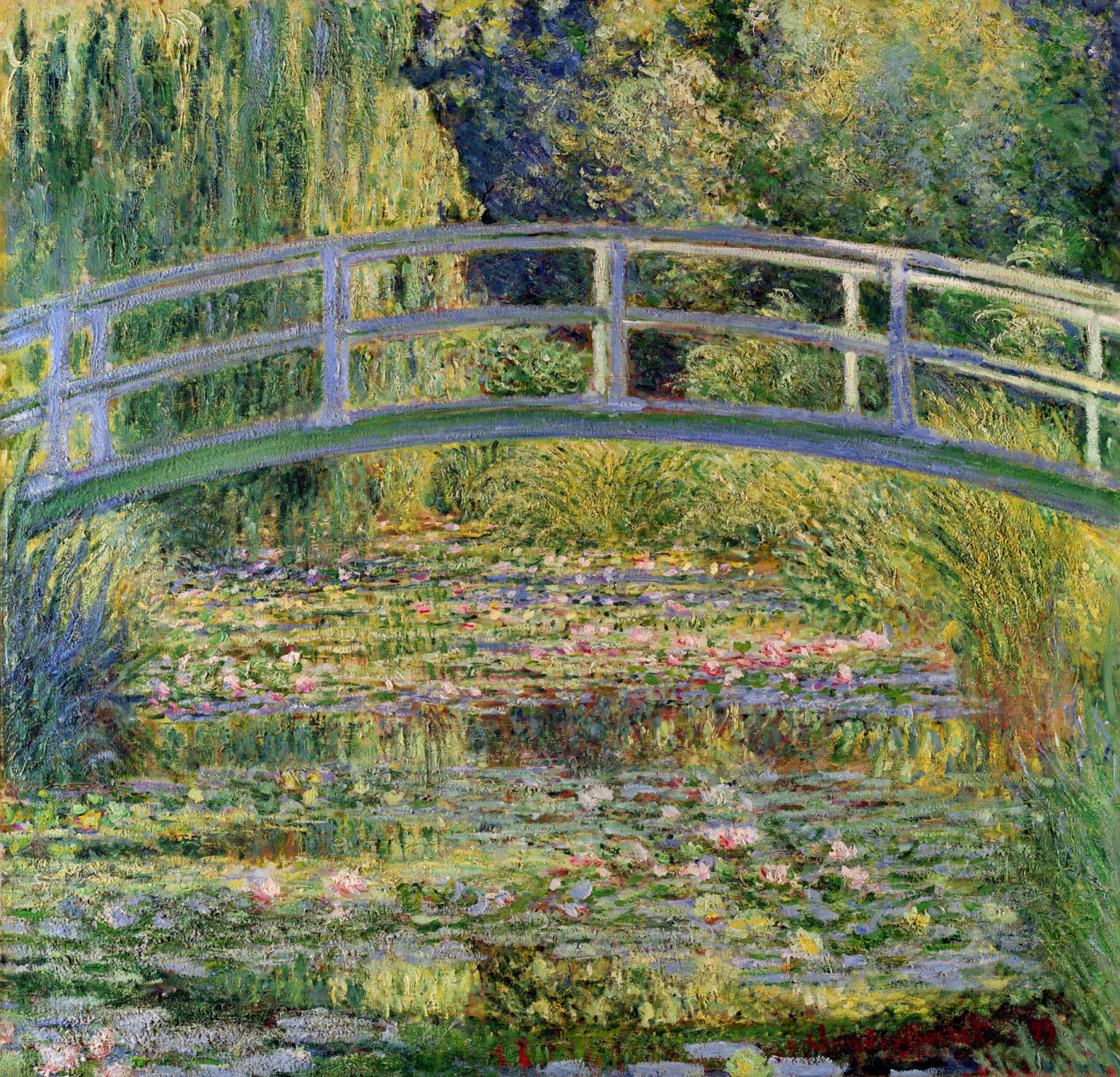 Claude Monet’s The Japanese Bridge (The Water-Lily Pond) from 1899, showing a pale arched Japanese bridge over a lily pond filled with pink and white water lilies, surrounded by lush green foliage and shimmering reflections.