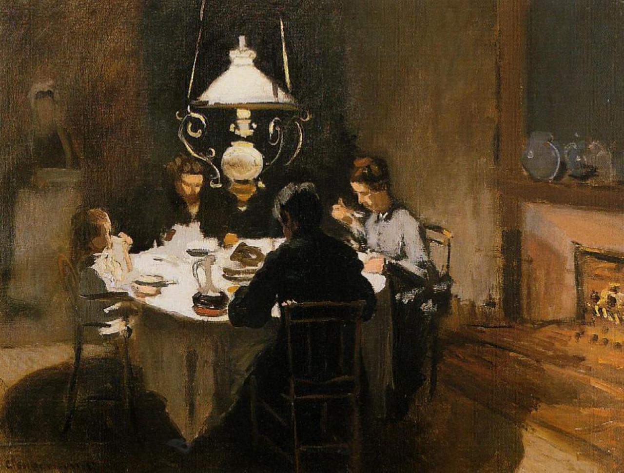 Claude Monet’s The Dinner from 1869, showing a family seated around a glowing dinner table beneath a hanging lamp in a warm, shadowed interior with a fireplace at the right.